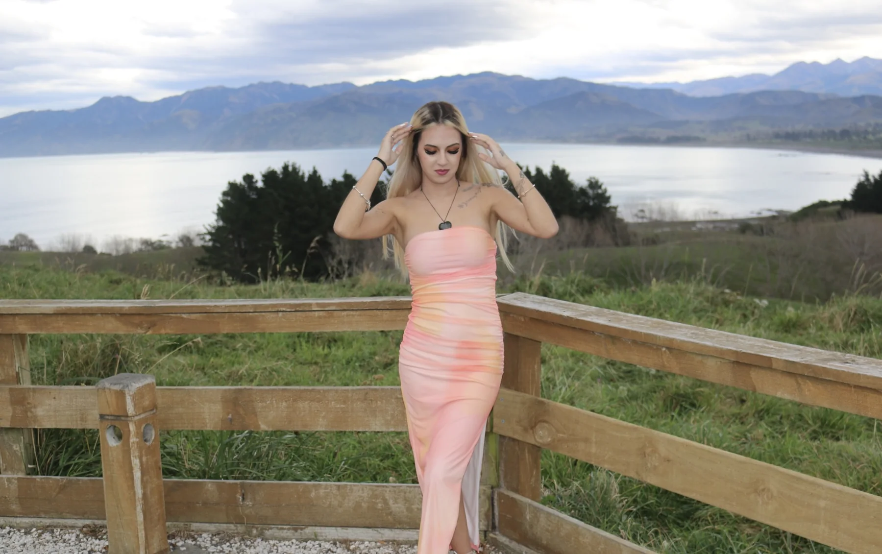 Outdoor coastal pink dress makeup portrait