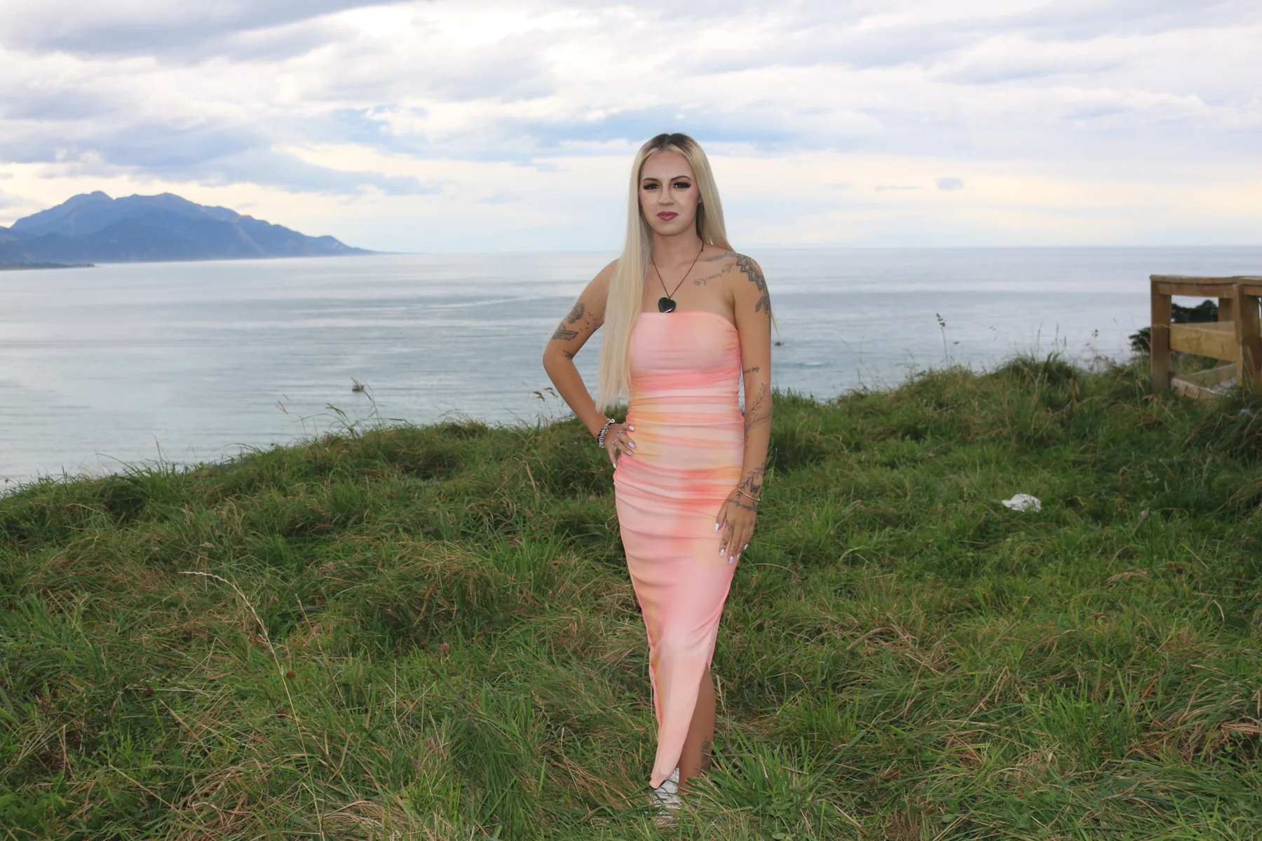 Kaikōura coastal pink dress makeup portrait
