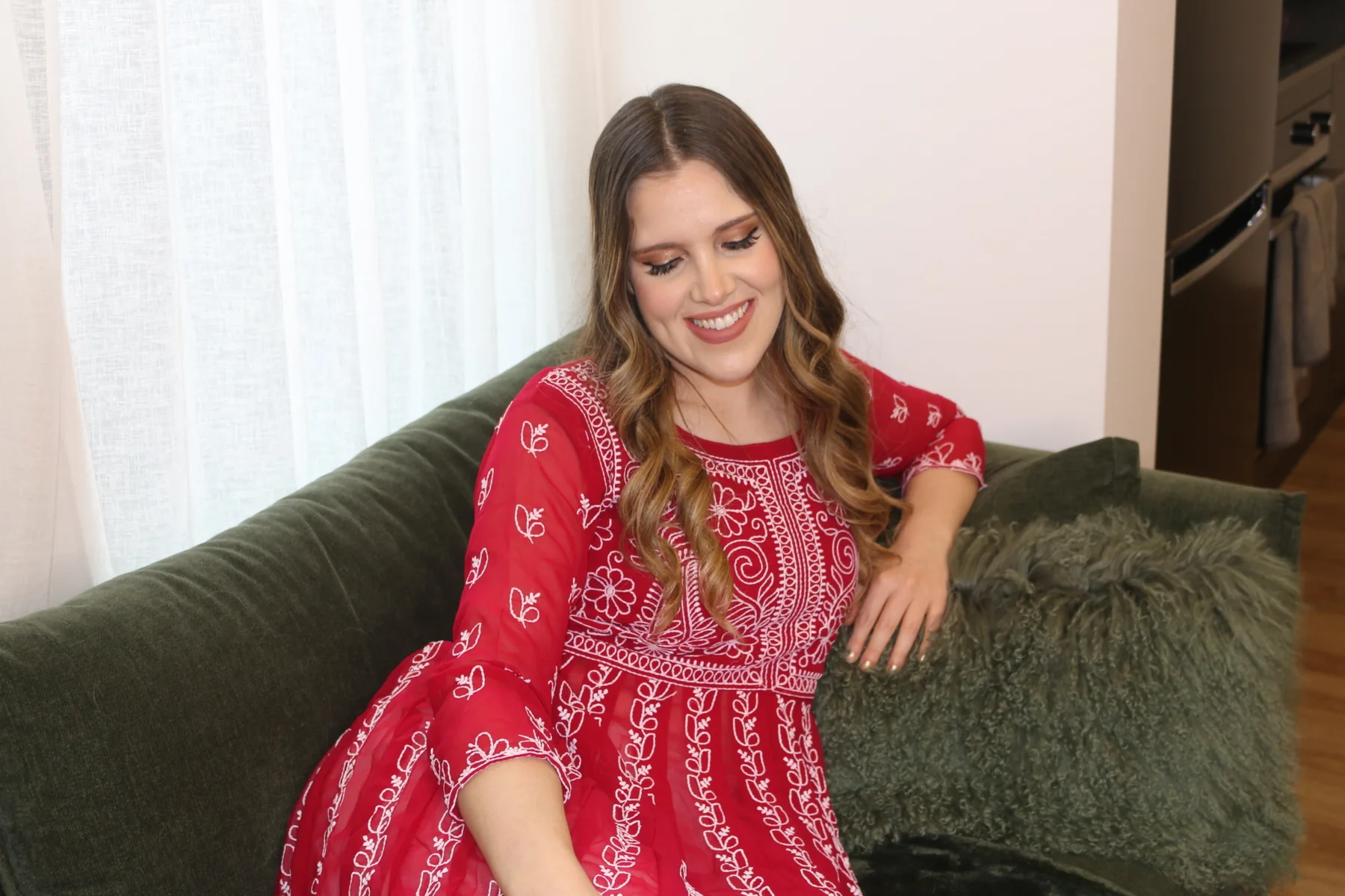 Red dress soft glam seated portrait